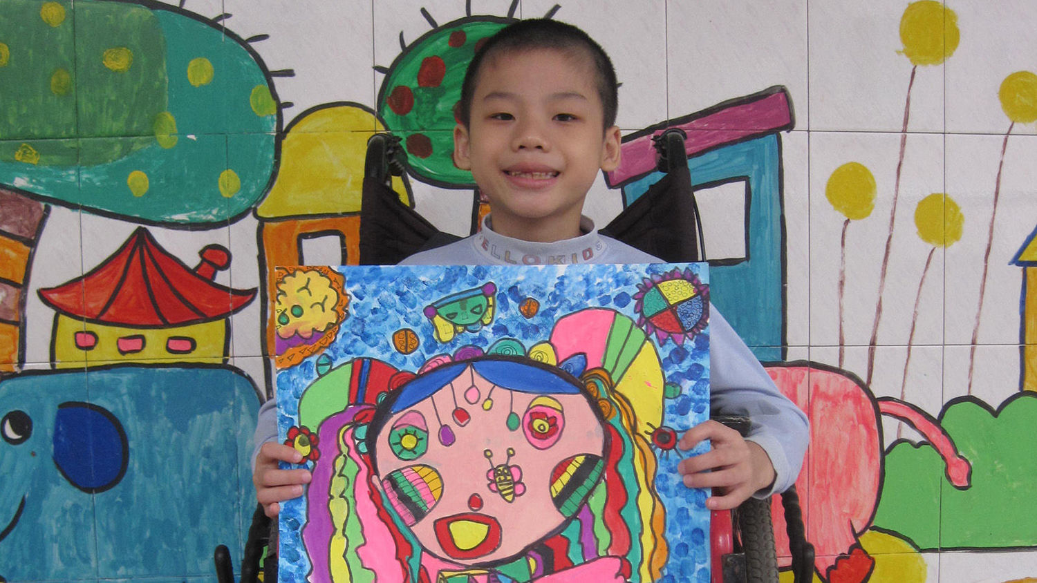 Wu Zhenhao at 8. Zhenhao, whose art training was funded by OneSky, was orphaned as an infant and joined OneSky’s programs at the age of four months.