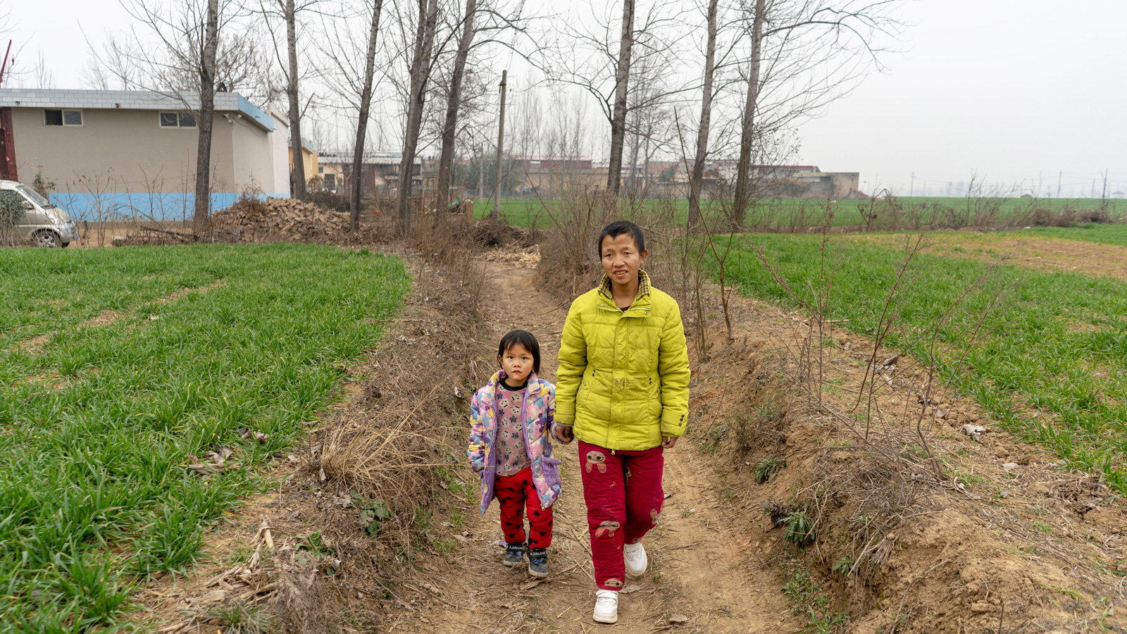 Zhenzhen's mother walks her to class