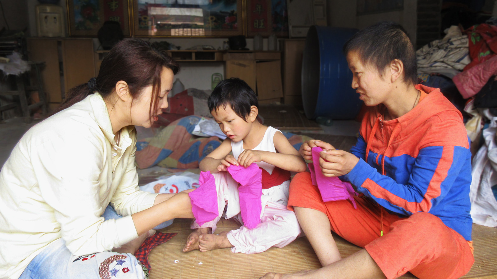 Zhenzhen with her teacher and mother
